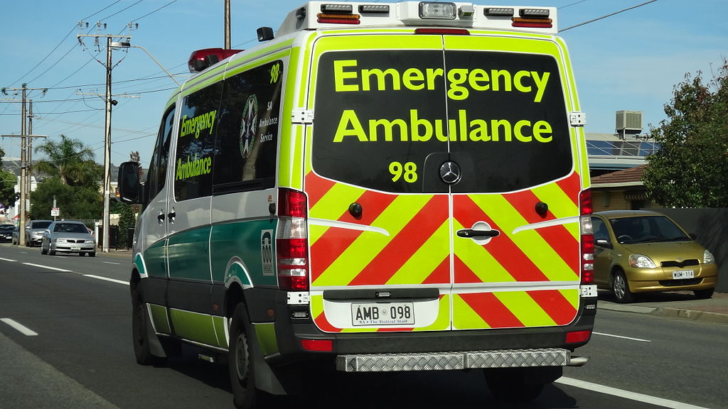 a SA ambulance driving on a road