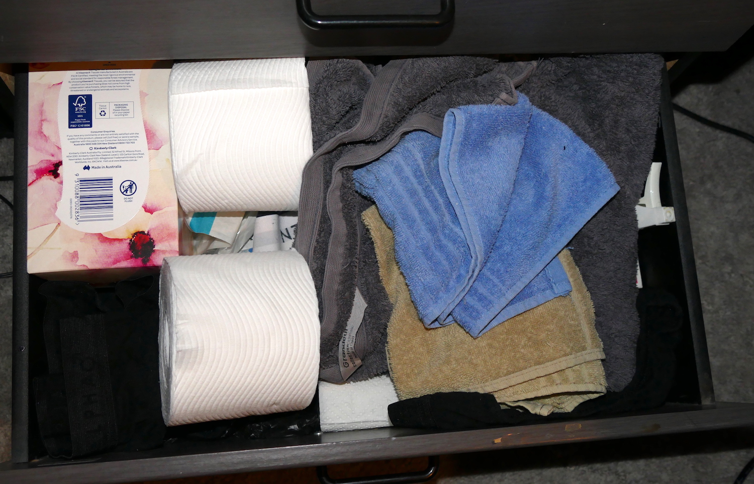 the bottom drawer contains many items to cope with bowel movements