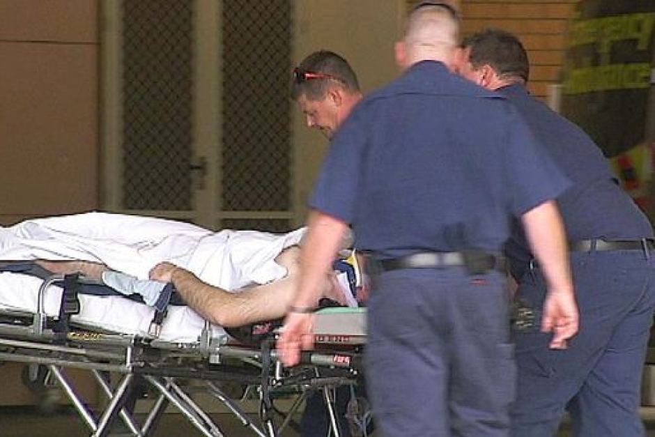 john on the stretcher arriving at hospital