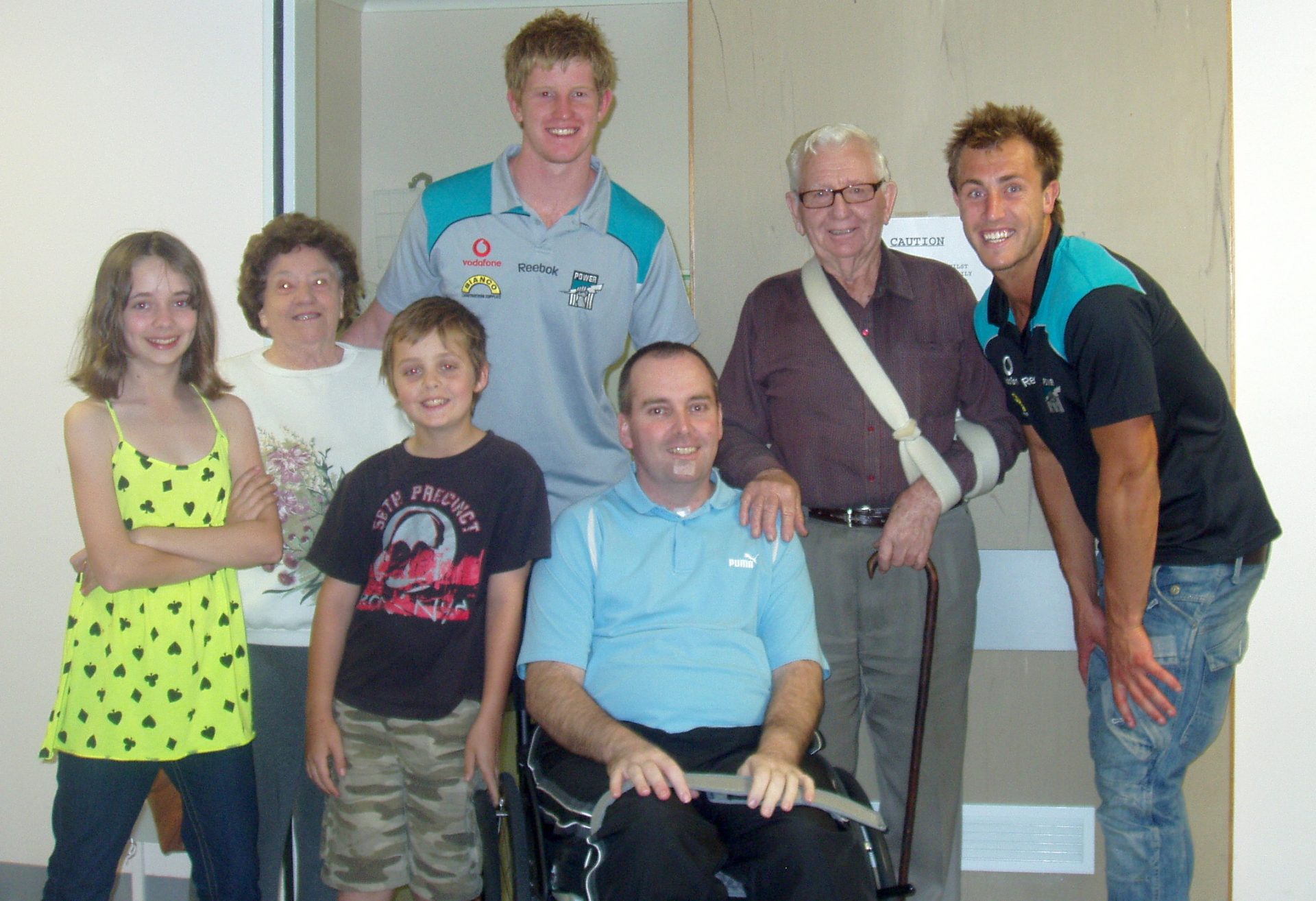 john, his dad, jasmine and ben and his mum are photographed with power players Matt Thomas and Matthew Lobey