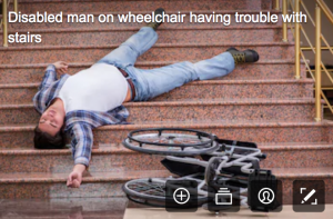 disability stock photographs - man laying on the steps, appears he tried to go down them in a wheelchair