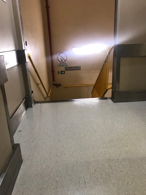 The accessible toilets are to the right. Ahead are the stairs. Lack of safety. Scentre Group accessibility needs to improve.