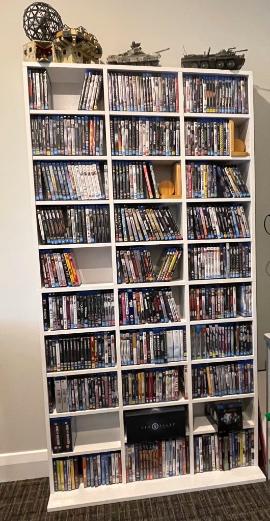 the finished case with movies and lego - Building furniture from a wheelchair