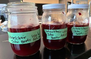 pickling beetroot - the finished product of 3 half filled jars with sliced beteroot and labels 'wheelchair john beets'