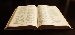 An open Bible illuminated in warm light, symbolising reflection, faith, wisdom, and the message of the <strong>Parable of the Lost Son</strong>. The image represents Christian faith, grace, repentance, and spiritual restoration during difficult seasons of life.